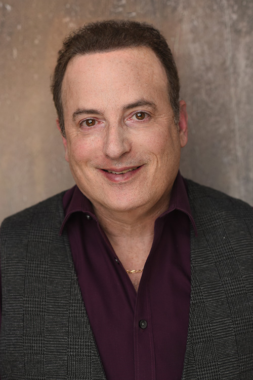 Aaron L. Schwartz Headshot capturing a range of emotions. 