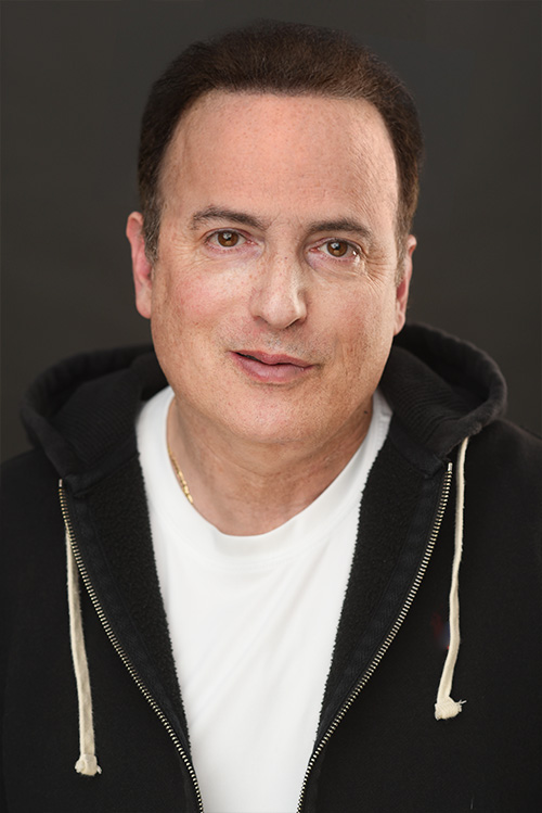 Aaron L. Schwartz Headshot capturing a range of looks. 